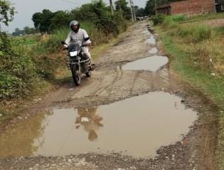 Bad road: Pond formed due to light rain