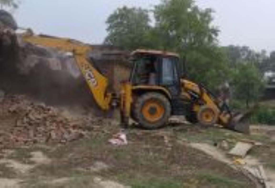Bulldozers ran on two houses built in the barn