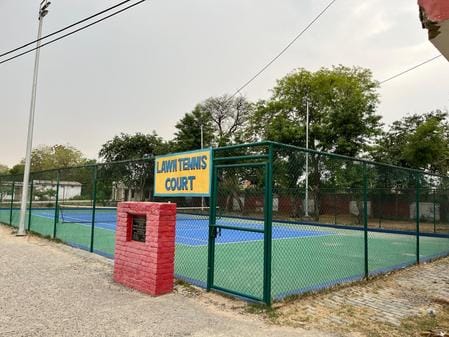 The lawn tennis court was renovated but no coach was found