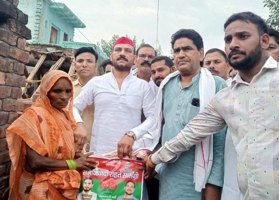 Former MP distributed relief material to fire victims