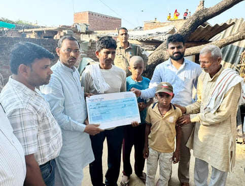 MLA Harish handed over the cheque to the victim's family