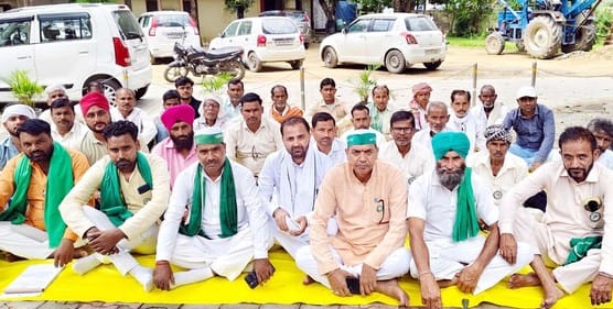 Bhakiyu workers sit on dharna at the power substation in Puwaiyan