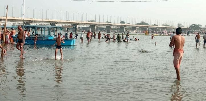 Taking a holy dip in the Ganges on Amavasya