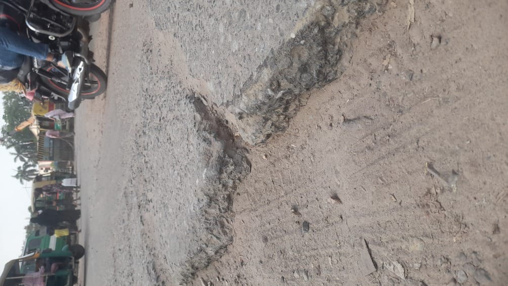 Potholes at Zero Miles are ruining business
