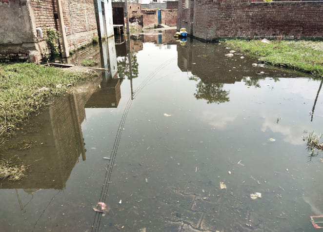Contaminated water filled in the street of Sanauli Khurd village