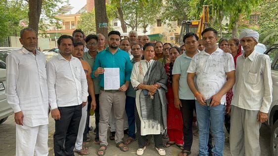 Protest against sewer blockage