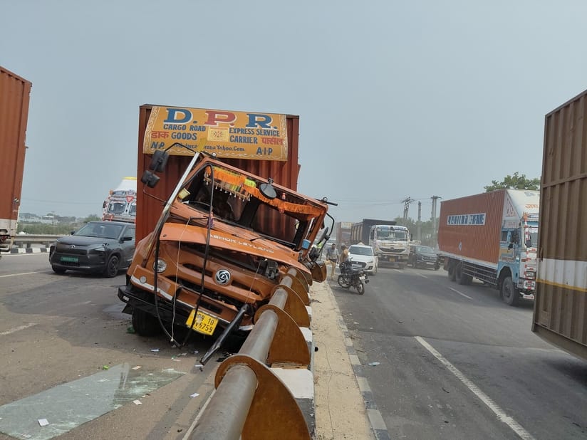 Canter collides with divider due to bus collision, jam for one hour