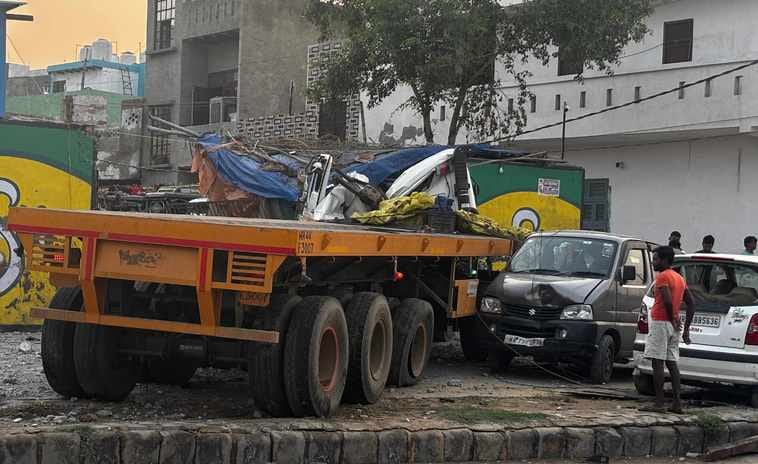 A trolley climbed onto the pavement in Durga Colony, hitting three parked cars and an electric pole