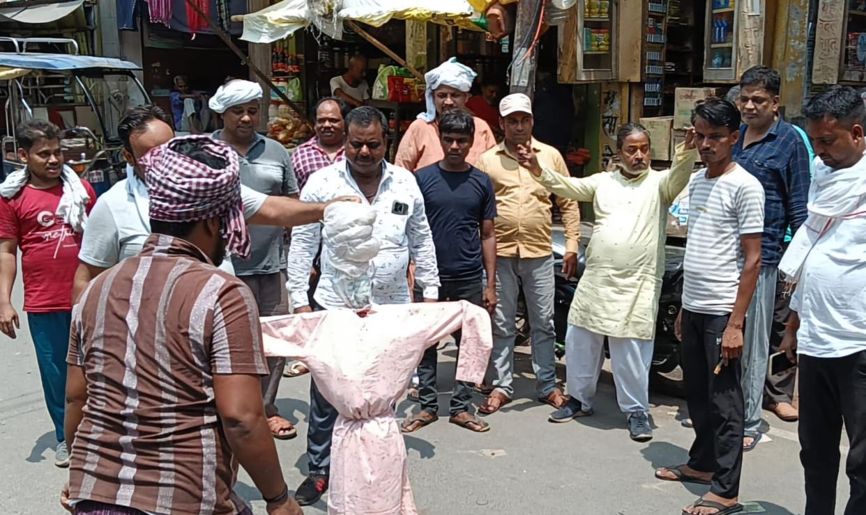 Protest expressed by burning effigy of electricity department