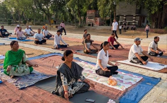 Physical education teacher doing yoga exercises.