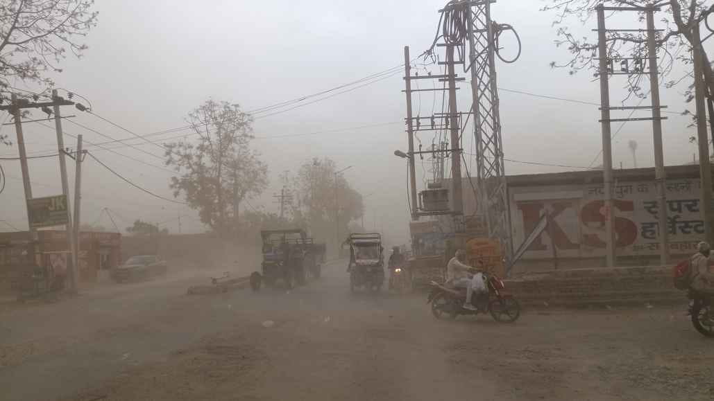 Dusty winds blew in the afternoon, drizzle brought relief from the heat