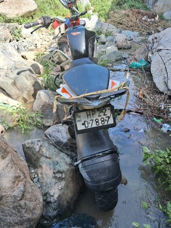 Bike and car collide, both drivers injured