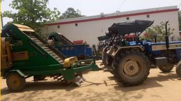 A loader involved in illegal mining and three tractor-trolleys laden with soil were seized