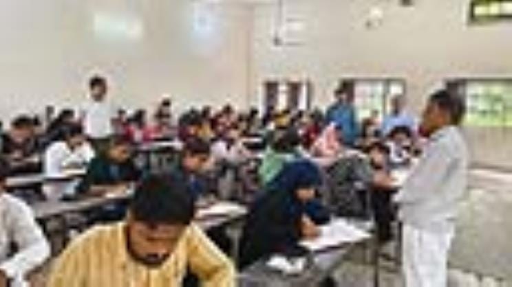 323 students appeared in the university examination, three were absent