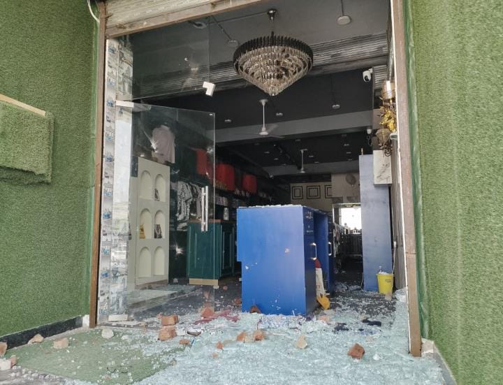 Builder injured after being attacked with swords over money dealings