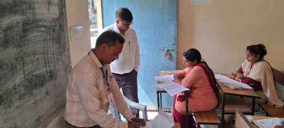 Candidates passed through door frame metal detector and appeared satisfied with the questions