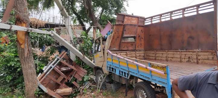 Pickup collides with electric pole, driver injured