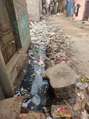 Piles of garbage, broken sewers and overflows everywhere in the colony.