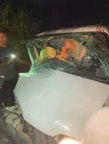 A young man died and five were injured in a collision between a car and a tractor-trolley