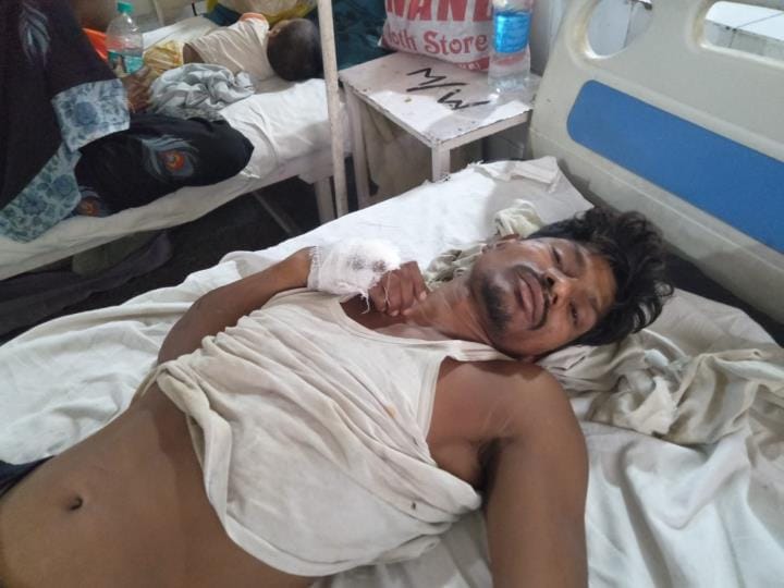Father and son were hit while backing the truck, father died