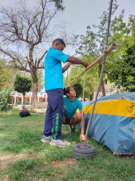 In practice at the government school playground, Pooja took an international flight, winning gold with a jump of 1.89 meters at the Asian Athletics Championship