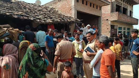 The body of a woman was found hanging from a noose inside the house