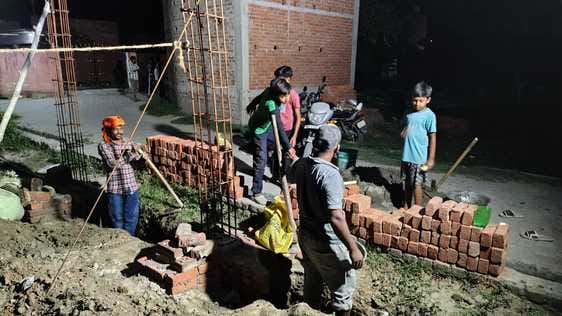 Donated labour in the under construction Kali Mata temple