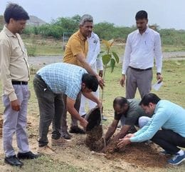 The superintending engineer planted a sapling and inspected the water treatment plant