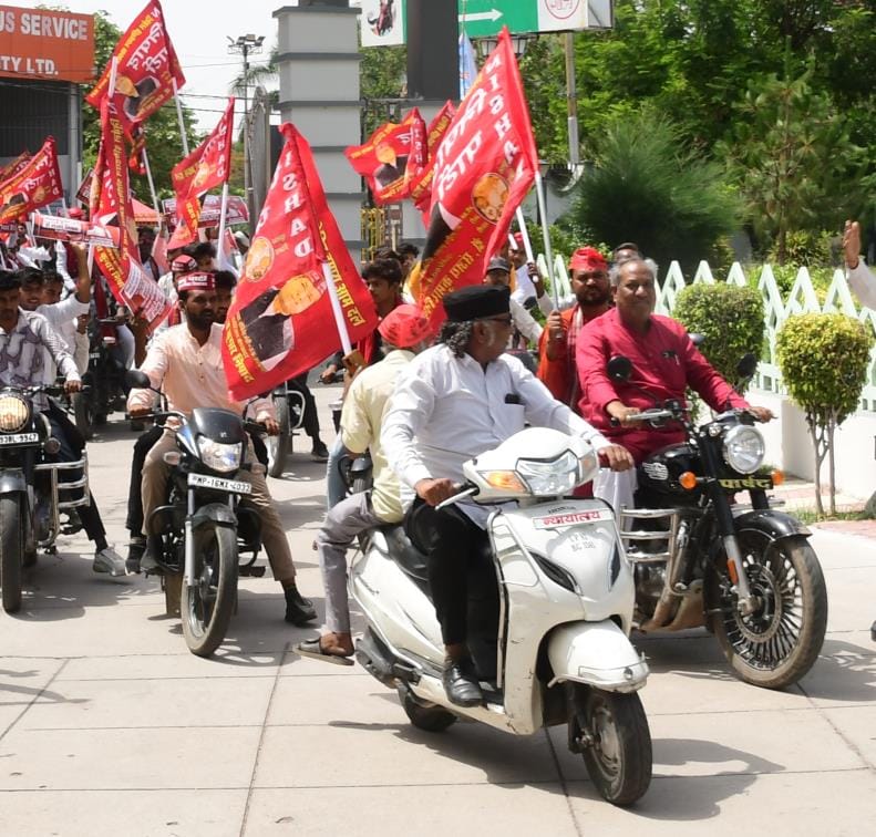 Fisheries minister rides a bullet without a helmet