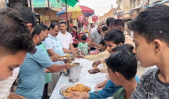 Bhandara and Sharbat were also distributed at many places