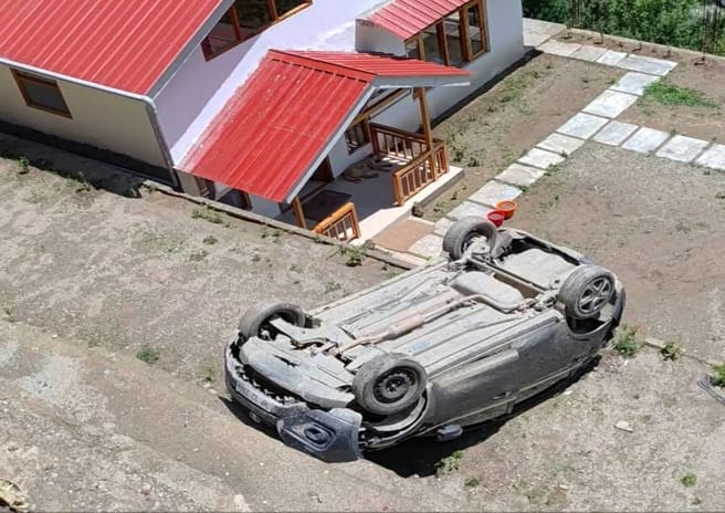 Car went out of control and rolled down the road