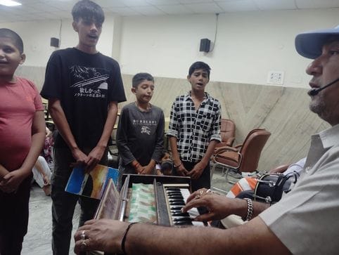 Children were given training for musical instruments, dance, acting and music