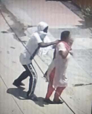 The snatcher came from behind, snatched the gold chain from the woman's neck and escaped