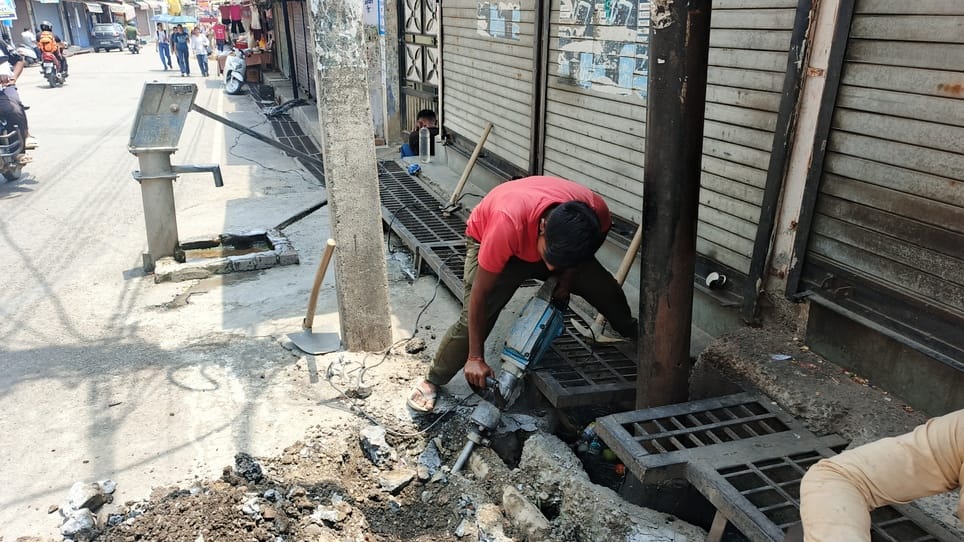 New poles are being installed in place of damaged electricity poles