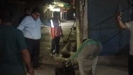 The corporation team cleaned the cloth market at midnight