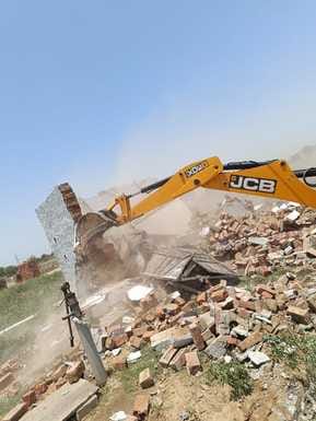 Bulldozer run on construction in illegal colony