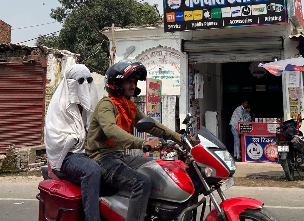 People are troubled by the scorching day and humidity