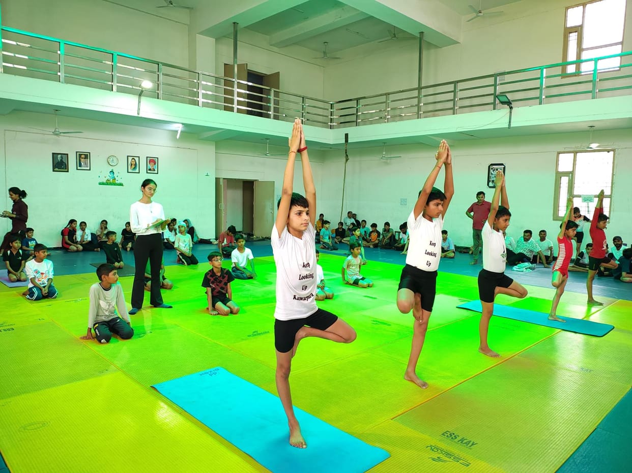 115 yoga practitioners showed their skills in the district level yoga competition