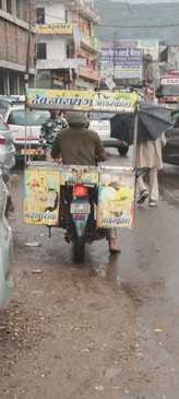 Ignoring traffic rules, carrying ice cream boxes on two wheelers