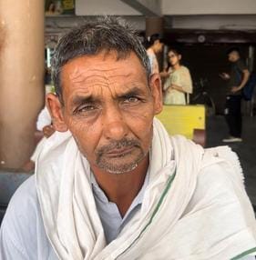 Helpless passengers...traveled hanging on the roofs and doors of private buses in the scorching heat