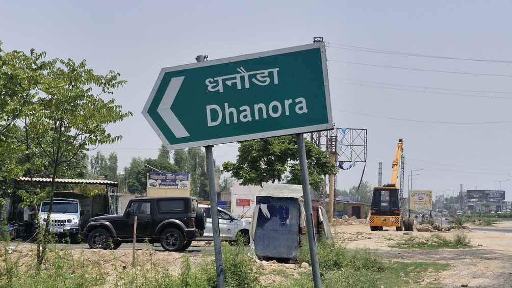 Artwork on signboard, Jhadumaajra village turned into Jhandumajra