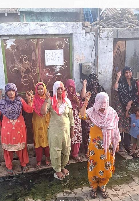 People fed up with waterlogging put up posters to sell their houses