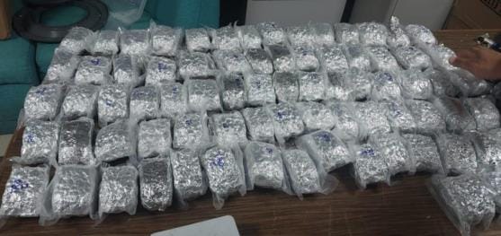 Two passengers carrying drugs worth Rs 15 crore from Bangkok were arrested at Amausi Airport