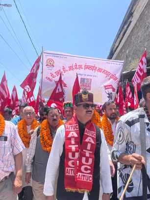 Workers demonstrated unity in Theog and took out a rally