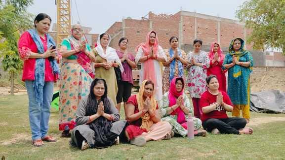Women sat in the sun and prayed to protest against the construction of a tubewell in the park