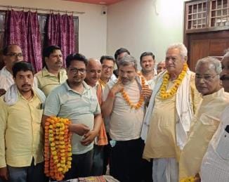 Kavindra became the president of the grain merchants association