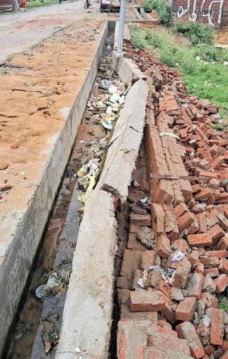 The drain could not withstand even light rain and collapsed
