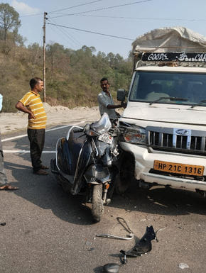 A young man returning home got hit in a collision between a scooter and a pickup truck