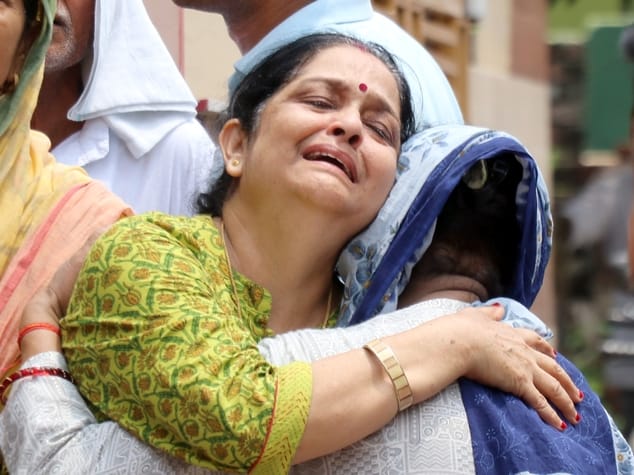 When the half-burnt body wrapped in foil reached home, a flood of tears started flowing