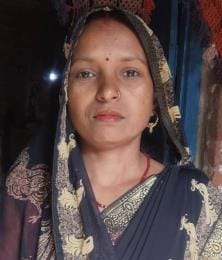 A woman was found hanging from a sari in suspicious circumstances